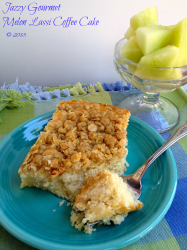 Brunch coffee cake with crumble topping on a serving plate